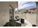 Cozy patio with seating area and views of the surrounding townhome community at 2020 W Union Hills Dr # 110, Phoenix, AZ 85027