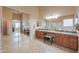 Spacious primary bathroom featuring dual sinks, granite counters and a glass enclosed shower at 21841 N Ingram Ct, Maricopa, AZ 85138