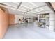 Spacious garage with an epoxy floor, lots of storage and a three car capacity at 21841 N Ingram Ct, Maricopa, AZ 85138