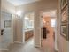 Hallway with views to the bathroom and bedroom at 21841 N Ingram Ct, Maricopa, AZ 85138