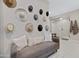 Stylish bathroom area with decorative hats on the wall, a bench and glass enclosed shower at 226 E Markwood Dr, Chandler, AZ 85286