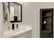 Modern powder room featuring a stylish vanity and decor at 226 E Markwood Dr, Chandler, AZ 85286