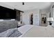 Light-filled primary bedroom offers a ceiling fan, closet and neutral colored walls at 226 E Markwood Dr, Chandler, AZ 85286