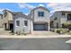 Charming two-story home features a neutral color scheme, attached garage, and well-maintained landscaping at 226 E Markwood Dr, Chandler, AZ 85286