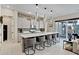 Elegant kitchen with gray cabinets, white countertops, long island, and pendant lighting at 226 E Markwood Dr, Chandler, AZ 85286