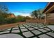 Beautifully landscaped backyard with custom stone and artificial turf design at 24645 N 117Th St, Scottsdale, AZ 85255