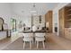 Elegant dining room with stylish furniture and modern lighting fixtures at 24645 N 117Th St, Scottsdale, AZ 85255