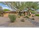 Inviting desert home with a charming facade and low-maintenance landscaping at 24645 N 117Th St, Scottsdale, AZ 85255