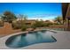 Beautiful pool with waterfall feature and mountain views, perfect for relaxing outdoors at 24645 N 117Th St, Scottsdale, AZ 85255