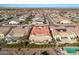 A desert community with lush landscaping, cozy patios, and solar panels offers comfortable living at 25971 W Taro Dr, Buckeye, AZ 85396