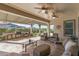 Comfortable seating with view of the outdoor kitchen and yard at 25971 W Taro Dr, Buckeye, AZ 85396