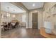 Bright dining room featuring hardwood floors and modern lighting fixtures at 25971 W Taro Dr, Buckeye, AZ 85396