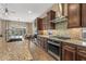 Stylish kitchen featuring stainless steel appliances and granite countertops at 25971 W Taro Dr, Buckeye, AZ 85396