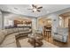 Open-concept living room featuring hardwood floors and inviting seating area at 25971 W Taro Dr, Buckeye, AZ 85396