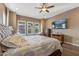 Spacious main bedroom featuring light wood floors, and natural light at 25971 W Taro Dr, Buckeye, AZ 85396