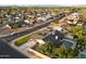 A neighborhood aerial view featuring a house with a pool and well-maintained landscaping at 2619 E Jerome Ave, Mesa, AZ 85204