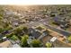 Aerial view of a home with a pool, landscaped yard, and neighborhood setting at 2619 E Jerome Ave, Mesa, AZ 85204