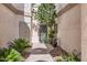 Charming front entry with desert landscaping, providing a welcoming curb appeal at 2801 N Litchfield Rd # 65, Goodyear, AZ 85395