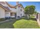 Well-maintained community featuring manicured lawns and mature landscaping at 2801 N Litchfield Rd # 65, Goodyear, AZ 85395