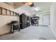 Spacious garage provides ample storage with cabinets and shelving, with sealed epoxy floor at 2801 N Litchfield Rd # 65, Goodyear, AZ 85395