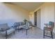 Comfortable covered patio with tile floor, perfect for relaxing and enjoying the outdoors at 2801 N Litchfield Rd # 65, Goodyear, AZ 85395