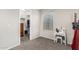 Clean bedroom with closet, and a small vanity by the window for a simple retreat at 2986 E Country Shadows St, Gilbert, AZ 85298