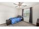 Cozy bedroom with window and simple decor, offering a serene atmosphere at 2986 E Country Shadows St, Gilbert, AZ 85298