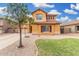 Inviting two-story home featuring a landscaped front yard and a convenient two-car garage with basketball hoop at 2986 E Country Shadows St, Gilbert, AZ 85298