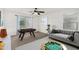 Bright game room featuring a foosball table, comfortable couch, and Scrabble game for entertaining guests at 2986 E Country Shadows St, Gilbert, AZ 85298