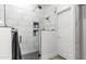 Modern walk-in shower with built-in shelves, a sleek design, and neutral tones at 3103 S Benton --, Mesa, AZ 85212