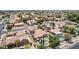 Aerial view of residential neighborhood with houses, swimming pools, and desert landscaping at 3441 S Halsted Pl, Chandler, AZ 85286