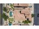 Aerial view of a home with a pool, patio, and well-maintained landscaping in a residential neighborhood at 3441 S Halsted Pl, Chandler, AZ 85286
