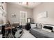 Neutral bedroom featuring a single bed with a gray comforter and a drum set at 3441 S Halsted Pl, Chandler, AZ 85286