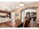 Open dining area featuring a long dining table, chairs, and views of the living room and kitchen at 3441 S Halsted Pl, Chandler, AZ 85286