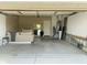 Spacious garage with room for parking, storage, and a living area at 3555 E Feather Ave, Gilbert, AZ 85234
