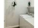 Functional laundry room with washer, dryer, and storage shelf at 3555 E Feather Ave, Gilbert, AZ 85234