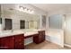 Bathroom features dual vanities, soaking tub, and separate shower, providing a luxurious feel at 3750 S Ashley Pl, Chandler, AZ 85286