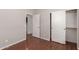 Neutral bedroom featuring hardwood floors, standard closet and two doors at 3750 S Ashley Pl, Chandler, AZ 85286