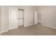 Bedroom with carpet, closet and white doors at 3750 S Ashley Pl, Chandler, AZ 85286