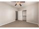 This bedroom includes a ceiling fan, closet, and carpet at 3750 S Ashley Pl, Chandler, AZ 85286