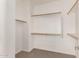 Walk-in closet with built-in shelving and ample storage space, maximizing organization potential at 3750 S Ashley Pl, Chandler, AZ 85286