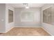 Bright dining area with tile flooring, neutral walls and three windows at 3750 S Ashley Pl, Chandler, AZ 85286