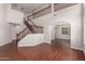 Stunning foyer with high ceilings, staircase, and wood floors, providing a grand entrance at 3750 S Ashley Pl, Chandler, AZ 85286