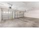 A spacious two car garage with a concrete floor at 3750 S Ashley Pl, Chandler, AZ 85286