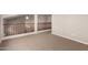 Carpeted loft space with wood railing and access to second floor rooms at 3750 S Ashley Pl, Chandler, AZ 85286