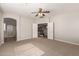 Spacious main bedroom with ceiling fan, connected to bathroom and walk-in closet, and carpet flooring at 3750 S Ashley Pl, Chandler, AZ 85286