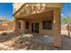 Covered patio area with sliding glass doors to the home's interior at 3750 S Ashley Pl, Chandler, AZ 85286