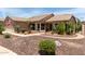 Charming single-story home featuring desert landscaping with an American flag waving in the front at 3930 E Colonial Dr, Chandler, AZ 85249