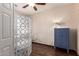 Bright bedroom with a stylish cabinet, privacy screen, and clear chair creating a cozy and inviting space at 3960 W Salter Dr, Glendale, AZ 85308