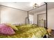 Comfortable primary bedroom featuring a canopy bed and designer furnishings at 3960 W Salter Dr, Glendale, AZ 85308